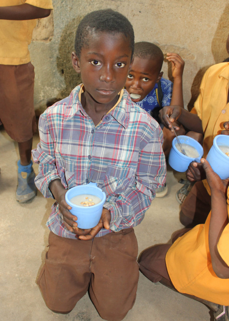 Bedabour D/A students enjoying their porridge